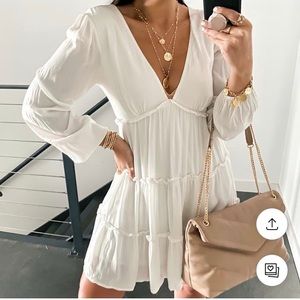 Forever 21 mini dress featuring ruffle trim, tiered construction, V-neckline